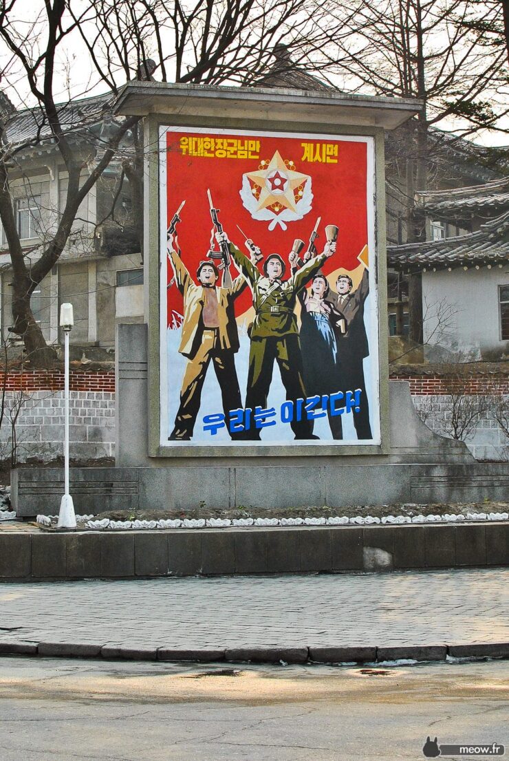 Vibrant patriotic propaganda poster promoting solidarity and revolution with military figures and symbolic elements.