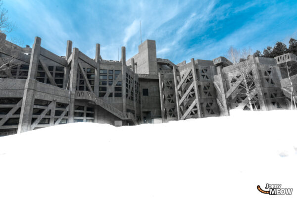 Abandoned concrete structure in winter landscape, Gunma, Japan - architectural beauty in decay.