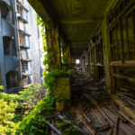 Exploring Gunkanjima: Abandoned City in Nagasaki - urban decay and haunting atmosphere.