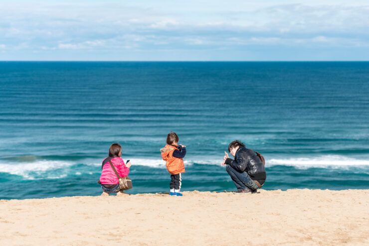 Exploring the tranquil beauty of Tottori Sand Dunes in Japan.