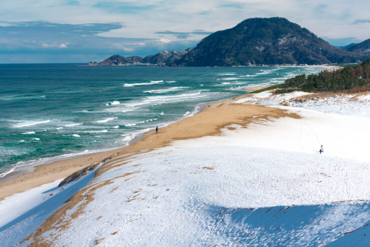 Natural wonder: Tottori Sand Dunes in Japan - majestic, serene, breathtaking landscape.