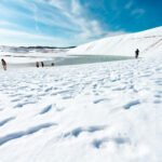 Winter Wonderland: Snow-covered Tottori Sand Dunes and Frozen Lake.