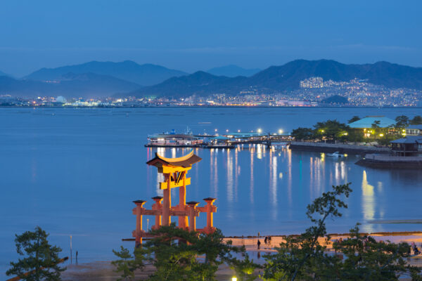 Miyajima Island at Dusk: Iconic Torii Gate, Serene Seto Inland Sea Beauty.