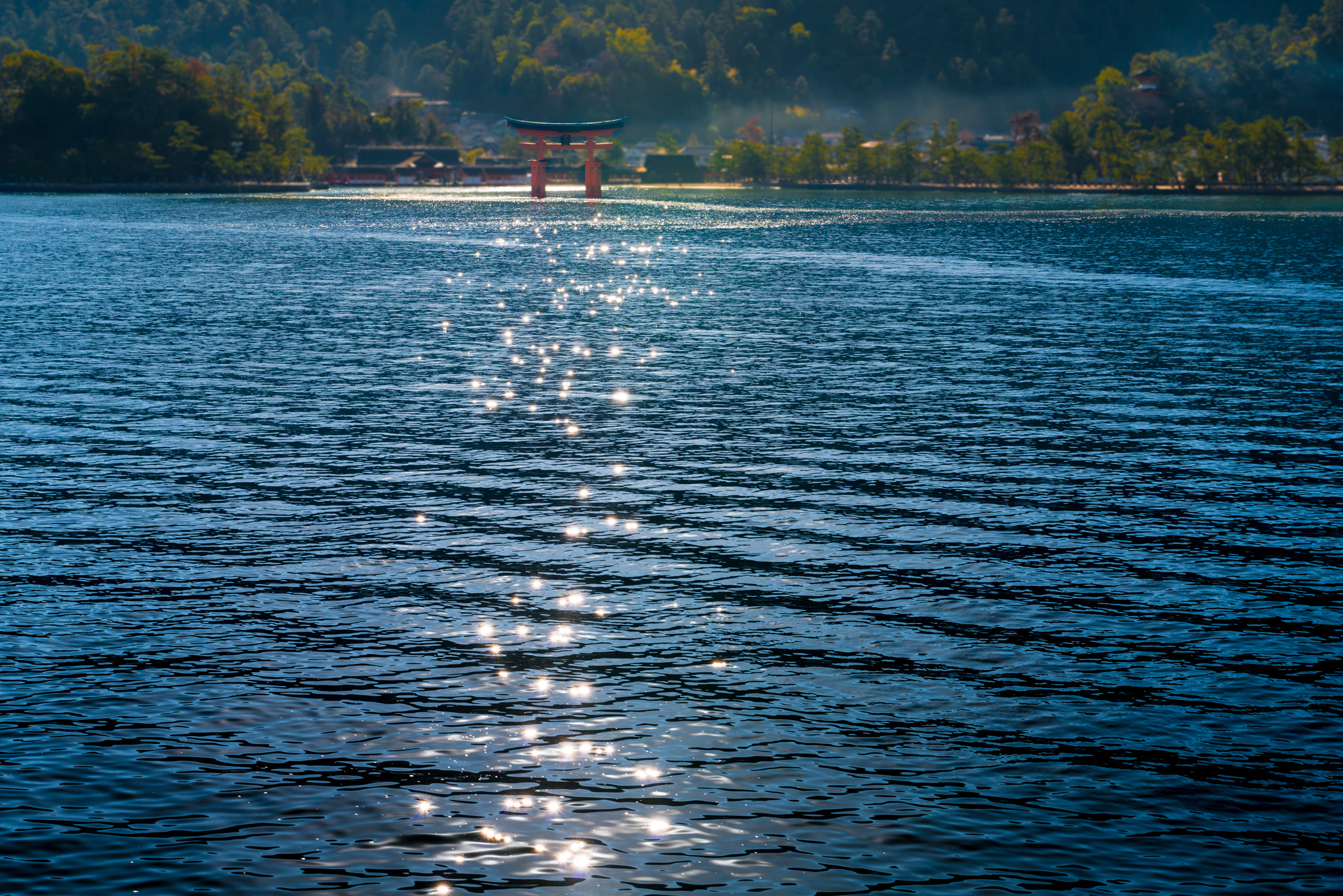 Serene Beauty: Miyajimas Iconic Torii Gate in Seto Inland Sea.