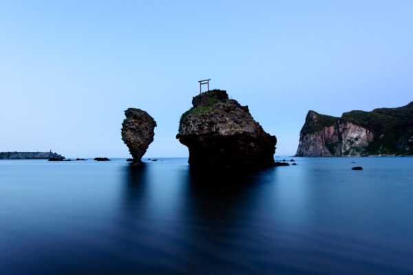 Majestic Guardian Rock Formations: Ebisu & Daikoku in a Coastal Setting.