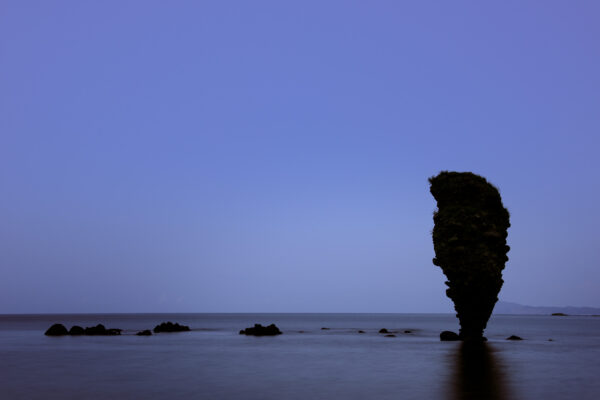 Guardian Rocks in Ebisu and Daikoku Bay, serene coastal landscape with volcanic formations.