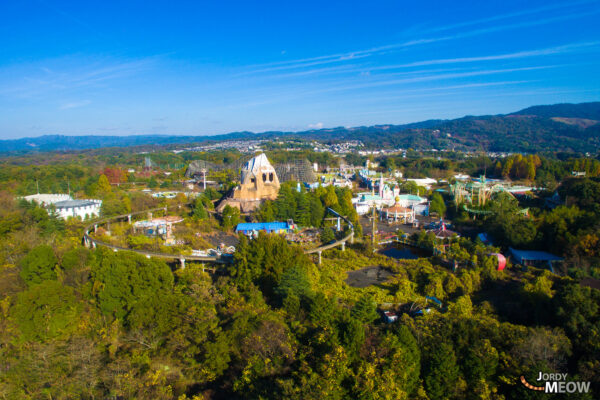 Eerie beauty of abandoned Nara Dreamland theme park captured in aerial view.