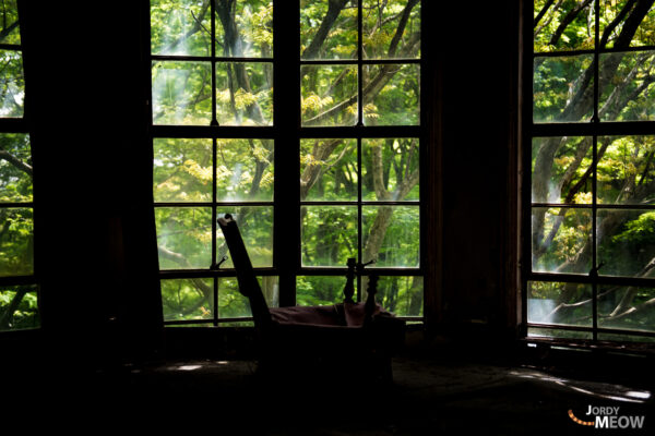 Decaying beauty of abandoned Maya Hotel in Kansai showcases nature reclaiming once-opulent interiors.