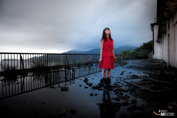 Desolate Beauty: Miki in Abandoned Japanese Hotel, Reflecting on Decay and Impermanence.