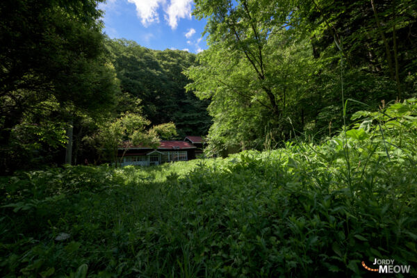 Lost in Time: Abandoned Niekawa School in Naganos Wilderness, a haunting blend of nature reclaiming.