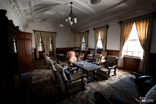 Decaying grandeur in abandoned room, Wakayama Prefecture, Japan: eerie beauty in decayed space.