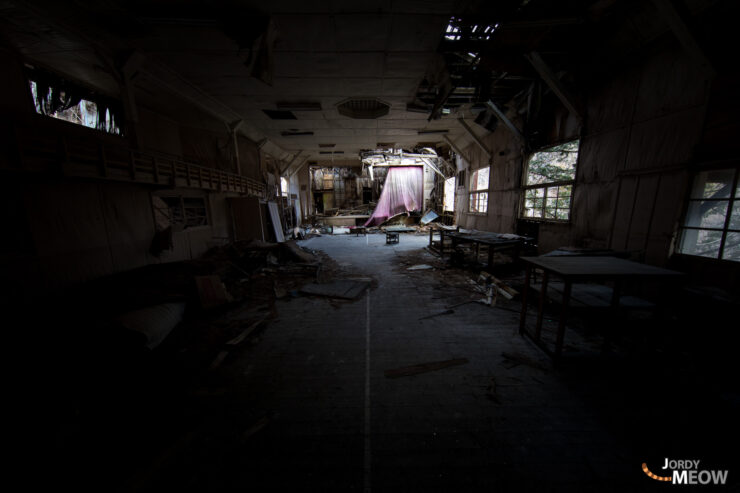 Exploring Nichitsu Ghost Town: Abandoned Japanese mining community with decaying interior and scattered debris.