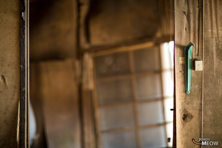 Exploring Nichitsu Ghost Town: Abandoned urban ruins in Japan, showcasing decay and forgotten lives.