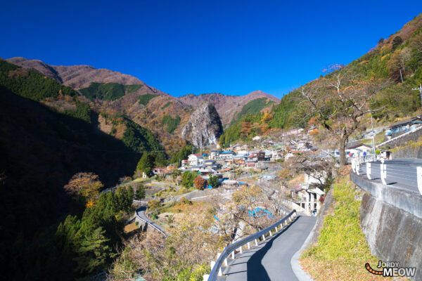 Inamura Rock in Nishitama: Serene Autumn Beauty with Traditional Japanese Charm.