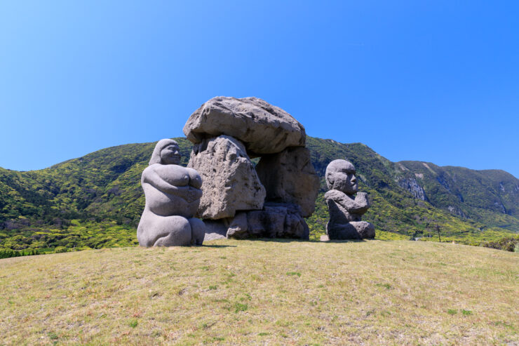 Captivating rock sculptures resembling human forms in Habushiura Natural Park.