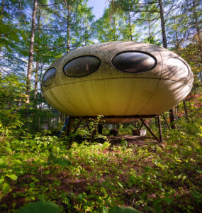 Abandoned Futuro House in Lush Japanese Forest