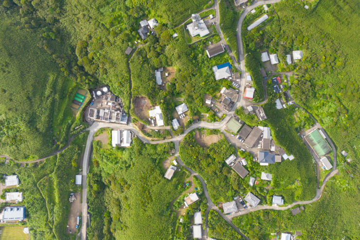 Lush volcanic Aogashima Island, aerial view captivates