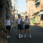 Quaint Japanese port town Tomonouras historic charm.