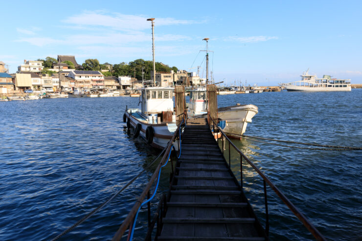 Tranquil Japanese Coastal Town with Historic Pier