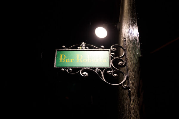 Vintage moonlit bar sign, Takehara Japan enchanting nightlife.