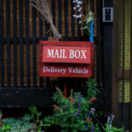 Rustic red wooden mail drop Takehara Hiroshima
