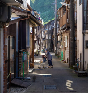 Quaint Japanese mountain village alleyway, traditional architecture