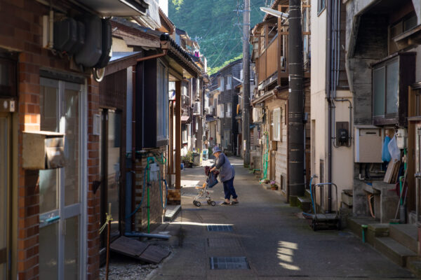 Quaint Japanese mountain village alleyway, traditional architecture