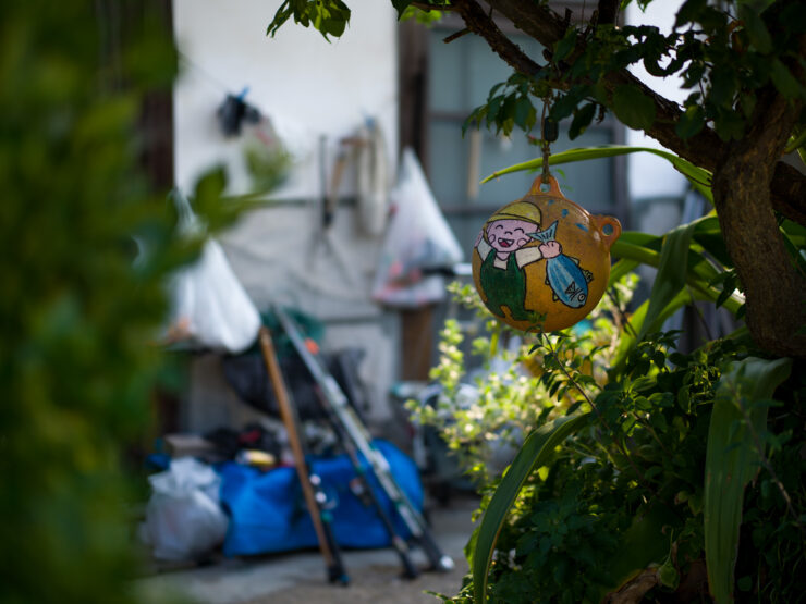 Whimsical Shishijima tree ornament, Japan island charm.