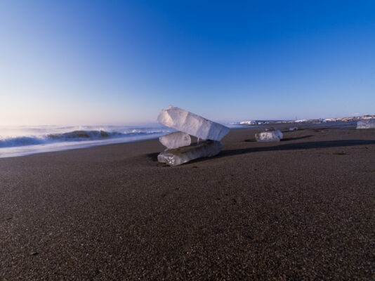 Icy Wonders on Otsus Volcanic Black Sand Beach