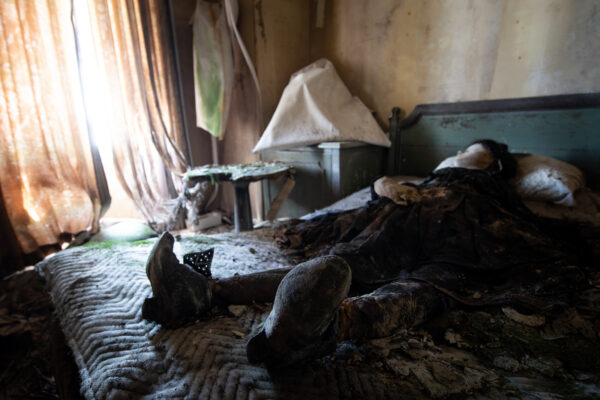 Vintage cluttered abandoned bedroom interior