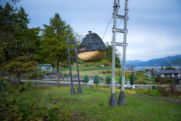 Suspended Spherical Garden Sculpture: Whimsical Art Delight