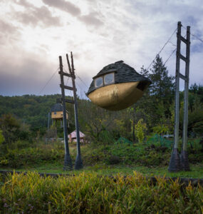 Suspended Whimsical Wooden Boat Sculpture