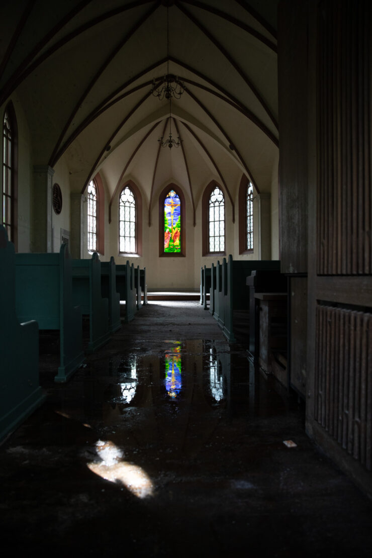 The Abandoned Gluck Kingdom Chapel: grand gothic interior, vaulted ceilings, stained glass windows.