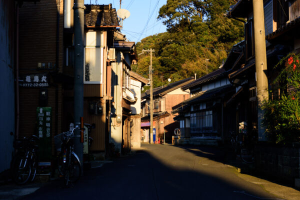 Charming boat houses in Ine, Japan showcasing traditional Funaya architecture by the sea.