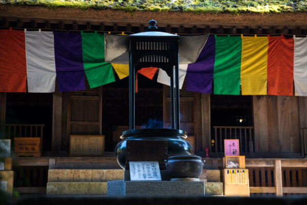 Omes Azalea-Surrounded Buddhist Sanctuary with Prayer Flags