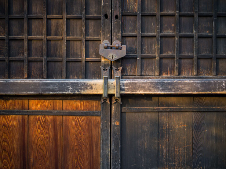 Intricately carved wooden gate Hida-Furukawa, showcasing Japanese craftsmanship.