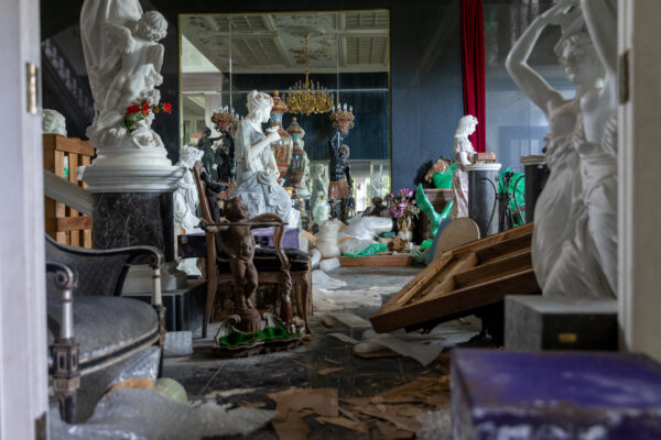 Crumbling grandeur inside abandoned ornate mansion