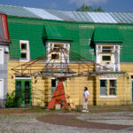 Whimsical Canadian village replica with vibrant buildings and unique pyramid-shaped structure.