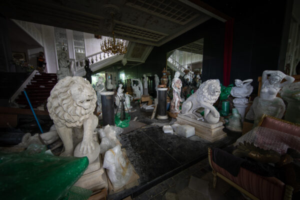 Crumbling mansion sculptures, haunting elegance