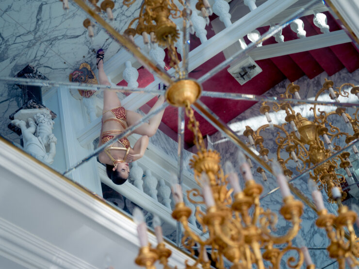 Opulent Marugen Mansion interior, grand crystal chandelier