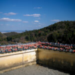 Serene lake, life jackets, water recreation.