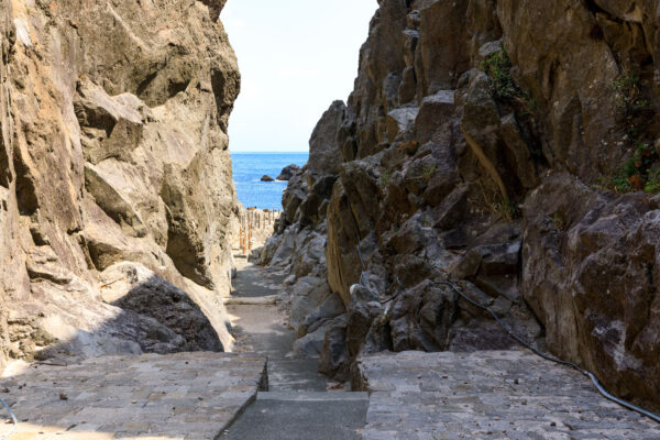 Winding Path Amidst Rugged Cliffs, Shikinejima Japan