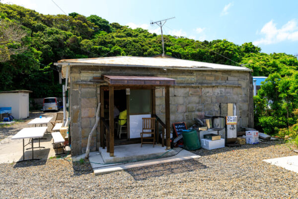 Shikinejima island cottage nestled in lush landscape