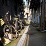 Charming Japanese Island Alleyway, Weathered Bicycles