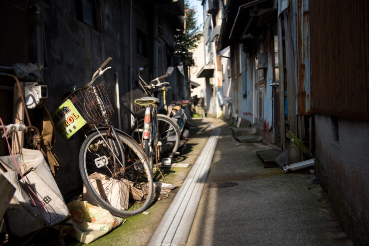 Charming Japanese Island Alleyway, Weathered Bicycles