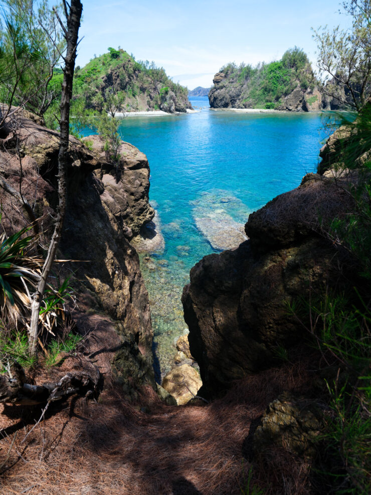 Tranquil Turquoise Inlet, Rocky Cliffs Paradise