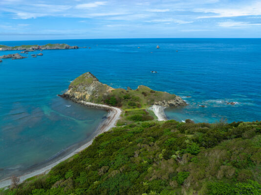 Lush Green Island, Turquoise Waters Coastal Paradise