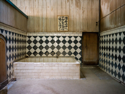 Abandoned tiled room interior photography