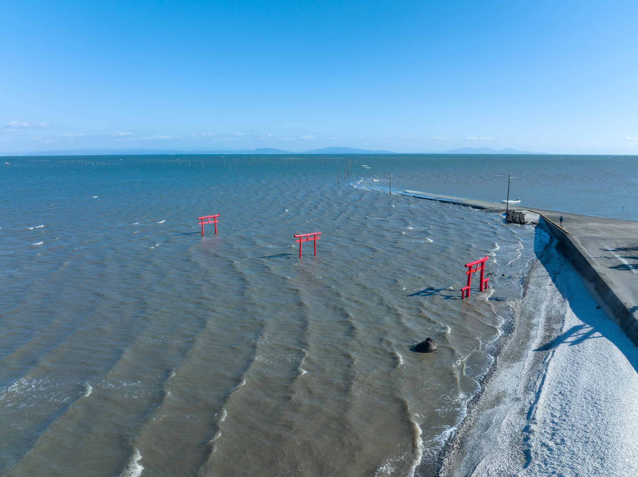 Coastal Serenity: Ouo Shrines Iconic Floating Torii Gates