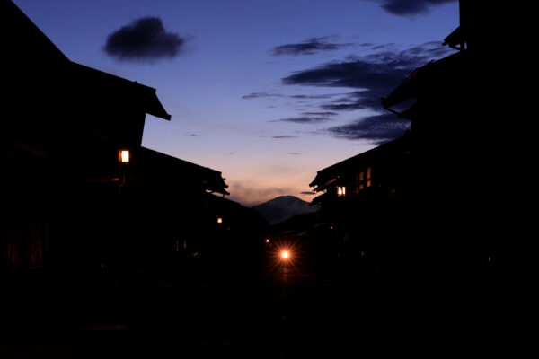 Tranquil mountain village street lamp dusk